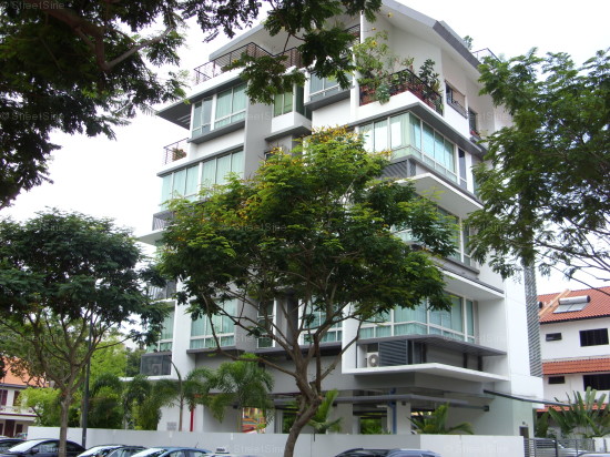 Geylang properties: JC Residence with the corner of the building has a view of the green neighborhood.